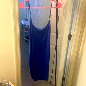 This is a short blue dress that is from Mexico